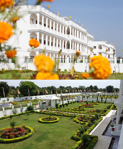Uno de los edificios y jardin para los huespedes en en Brahmasthan de India.